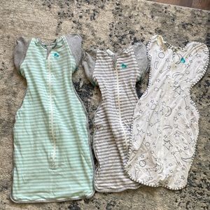Bundle of 3 “Love to Dream” swaddle sacks. 1 large and 2 medium.